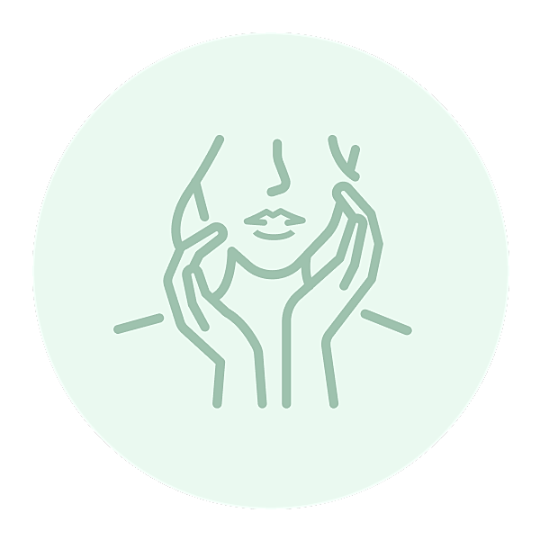 Outline of a woman touching her face.